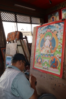 Thangka painting requires a month or longer with dedication to every tiny detail